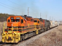 GEXR's newest arrival SD40-2 3403 began life as non Dash-2 Canadian Pacific #5516. Retirement would find it making a trip to Alstom in Montreal for a full rebuild into a SD40-2, including removal of its Canadian style steps in exchange for standard EMD steps. From there it went into the FURX lease fleet as number #3003, then eventually sold to GW where it was assigned to the Southern Ontario Railway. More motive power issues on the GEXR has found it relocated once again. Here we see 3403 leading Goderich - Exeter train 431 towards Stratford, just west of Acton. Just out of view in the background is a new GEXR customer having a spur being constructed, service should begin later this year.