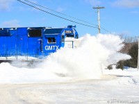 <b>Memories of winter!!</b><BR> After another snowstorm hit the area, GMTX 2666 leads an New Brunswick Southern Railway eastbound freight, as they bust through another snow filled crossing along the McAdam Sub. 2015 was a cruel winter for the railroads.