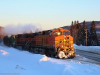 Back between 2012 and 2015, foreign power was a common occurrence on the New Brunswick Southern Railway. Near the end of February, 2015, BNSF 5234 leads an eastbound New Brunswick Southern Railway freight, as they head into the sunrise at Welsford, New Brunswick. 