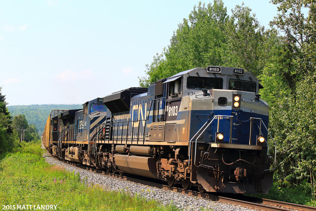SD70ACe demonstrator 8103 leads eastbound train 306, shortly after heading by Glendyne, approaching the Quebec/New Brunsick border. A pair of BCOL blues make up the rest of the consist. Was lucky to catch the leader still in the it's demo colors, as it was a painted a short time later.