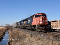 CN 5716 with GECX 9150 and GECX 7354 meet train 385 at Waterworks Sideroad east of Sarnia, ON.