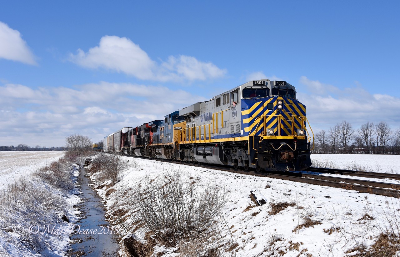 I had heard that this power was leading Train 394 into Sarnia but didn't make it in time to see it arrive. It's not unusual to cut power off and replace it but it's rare that the power is changed on Train 509 back to London, ON. Lucky for me this day this power ended up on 509 and a nice overnight snowfall blanketed the ground for CREX 1501, GECX 7813, CN 3000 and CN 5483.