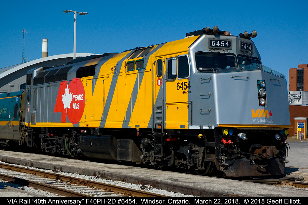 I like my wraps 'fresh' and with a heads up from Jesse McLaughlin the night before, I knew that VIA 6454, with it's new 2 day old 40th Anniversary wrap, was coming to Windsor on train #71 this morning.  It was a beautiful day and after the train had turned to become #76 and backed into the station, the light was then perfect to grab a shot of this very fresh looking unit.