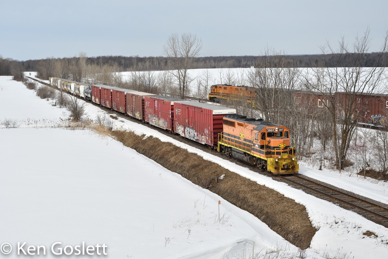 Quebec Gatineau 3801 heads east on the Lachute sub toward Ste-Therese as units 2302, 2300 head north on the Montfort sub.