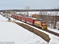 Quebec Gatineau 3801 heads east on the Lachute sub toward Ste-Therese as units 2302, 2300 head north on the Montfort sub.