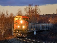 With the last bit of light, CN 2444 leads westbound train 406 as they round the bend at Rothesay, New Brunswick. Moments after the train passed, the sun dipped below the horizon for another day. 