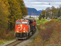 CN 3089 leads potash train B730, as they round the bend at Renforth, New Brunswick. 