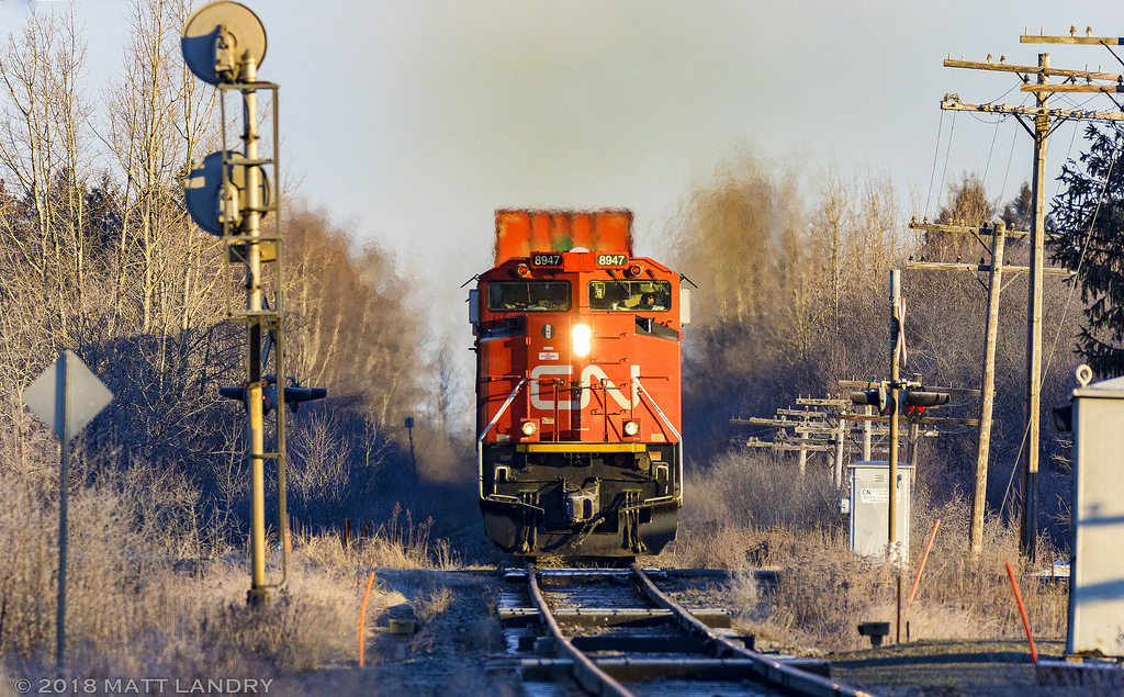 In a frosty sunrise, CN 8947 powers CN Q120, as they approach Maccan, Nova Scotia. Shot with my Sigma 150-600mm lens.