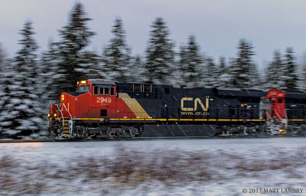 Panning an AC, 2949, as they head through the snow at Passekeag, New Brunswick.