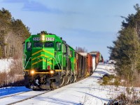 NBSR 6318 leads a westbound New Brunswick Southern Railway freight, as they negotiate the terrains of the McAdam Sub, approaching Cork, New Brunswick. 