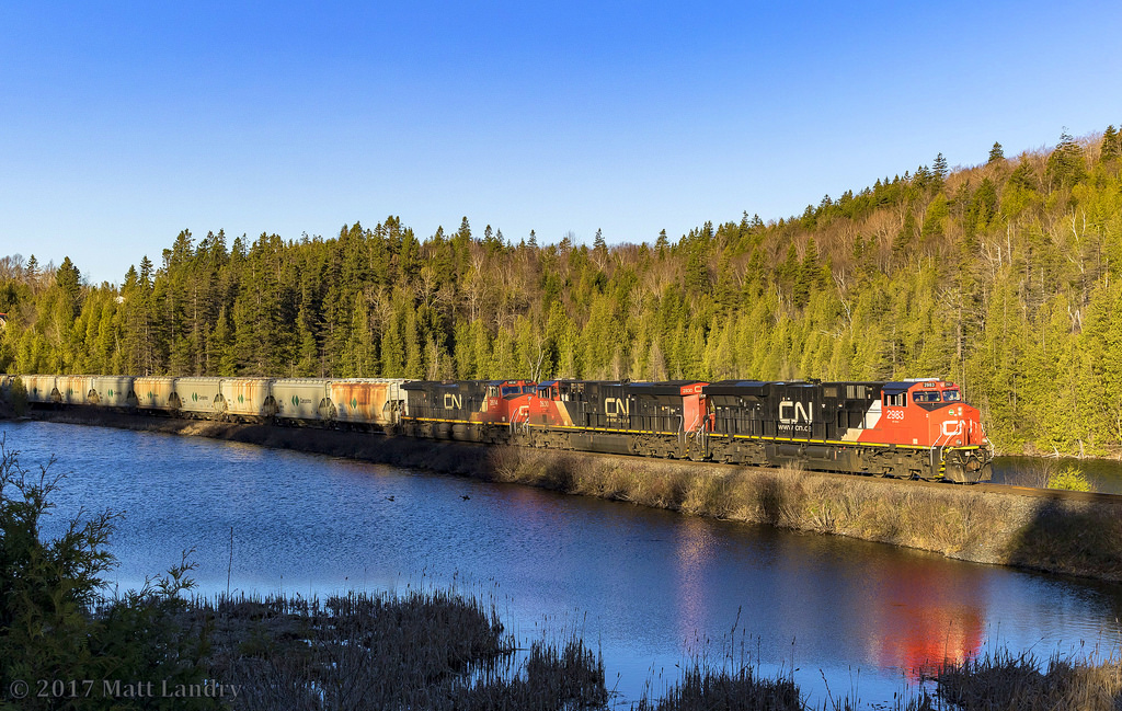 CN 2983 leads a small eastbound 594 empty potash train, as they make the uphill climb out of Saint John, New Brunswick with relative ease, as they approach Torryburn, and Renforth, New Brunswick. This is a location that I like to shoot at, but eastbounds first thing in the morning rarely run, so I couldn't pass this shot up on this morning.