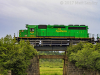 NBSR 6318 leads an NBSR eastbound 908 train, as they enter Saint John's yard limits, crossing over a small trestle as they arrive. I like how I was able to nab a good reflection of the leader. 