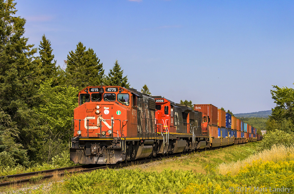 Pride of the fleet makes a rare mainline appearance, as 4775 leads train 406 at Passekeag, New Brunswick.
