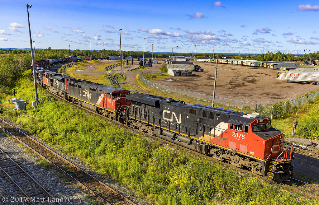 CN 2875 heads under the overpass at Gort, as they put their train together at Moncton, New Brunswick, with a six unit lashup.