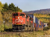 CN 8886 leads westbound train 406, as they approach mile 61 of the Sussex Sub, at Passekeag, New Brunswick, in nice Fall light. 