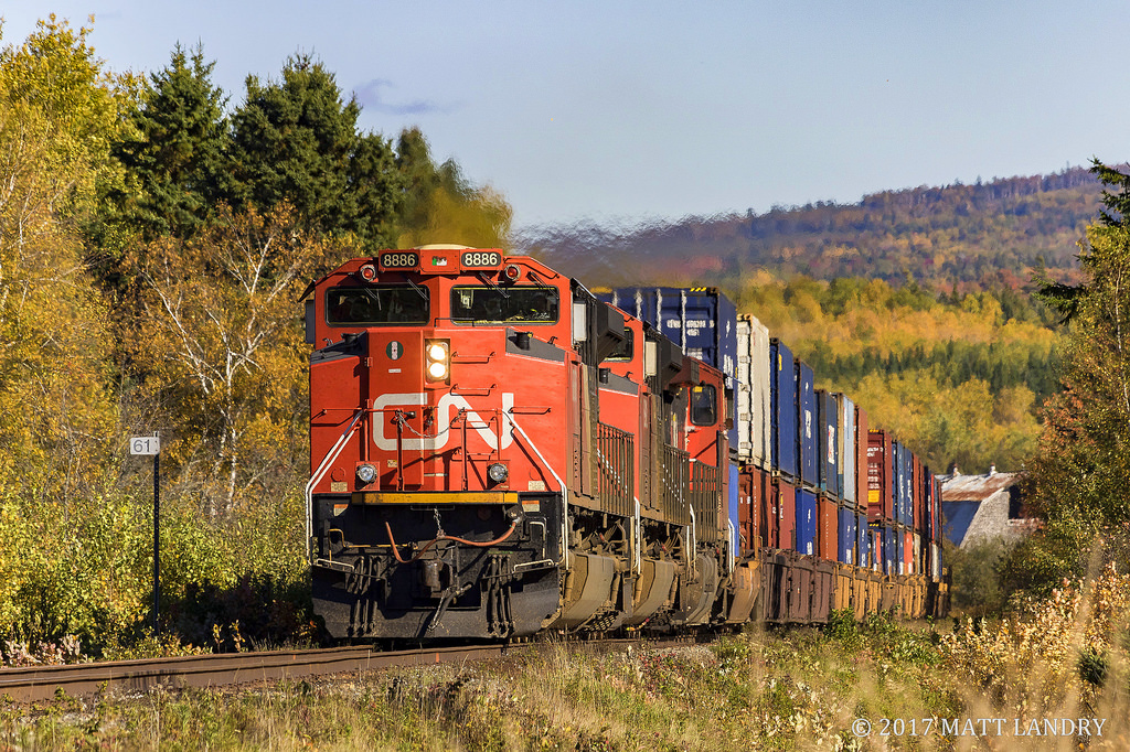 CN 8886 leads westbound train 406, as they approach mile 61 of the Sussex Sub, at Passekeag, New Brunswick, in nice Fall light.