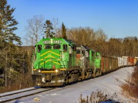 Nearing the day's final light, NBSR 907 approaches the Canada/USA border into Maine, after a crew change and working at McAdam, New Brunswick. 