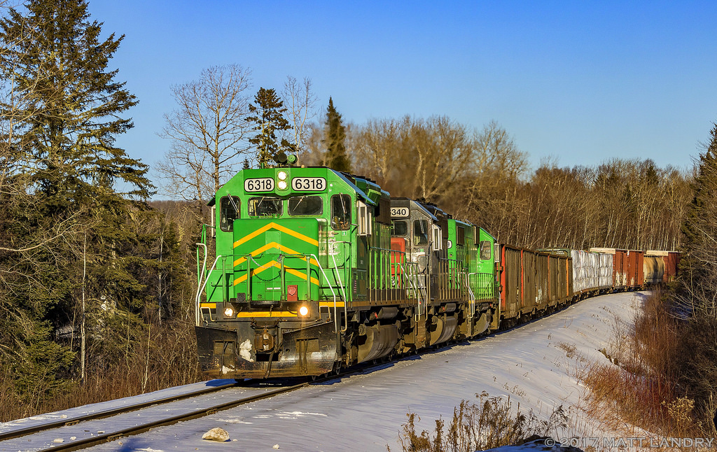 Nearing the day's final light, NBSR 907 approaches the Canada/USA border into Maine, after a crew change and working at McAdam, New Brunswick.