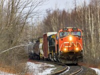 CN 2236 leads eastbound train X474, as they round the bend approaching Berry Mills, nearing their final destination of Moncton, New Brunswick. GECX 9142, an ex CSX unit, is trailing in this consist. 