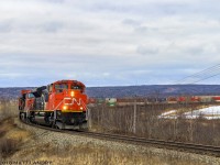 CN 8950 leads stacker train Q120, as they round the horseshoe curve at Dorchester, New Brunswick. Unfortunately, the vegetation has grown in this spot over the years, making it a bit trickier to nab the photo I'm looking for. 