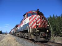 A wonderful spring day, train 570 stopped at Macalister siding doing some switching.