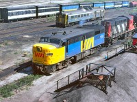 VIA 6776 and 3121 in CN livery await their next trip. It was a wonderful place for a railfan, hanging over the bridge and snapping pictures as well as quick tours through the roundhouse.