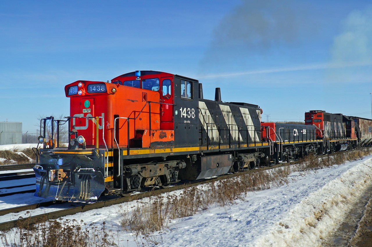 Yard switching duties at Clover Bar today in the hands of GMD-1u CN 1438 and GP38-2 CN 7526 paired with YBU-4m 526