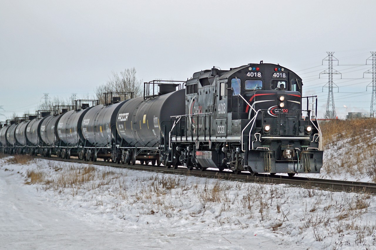 GP9RM CCGX 4018 (ex CN GP9RM) approaches 84th Ave as it heads south on The CN Camrose Sub with a rake of tank cars from the ESSO refinery to the storage sidings at Tilley.