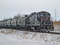 GP9RM CCGX 4018 (ex CN GP9RM) approaches 84th Ave as it heads south on The CN Camrose Sub with a rake of tank cars from the ESSO refinery to the storage sidings at Tilley.