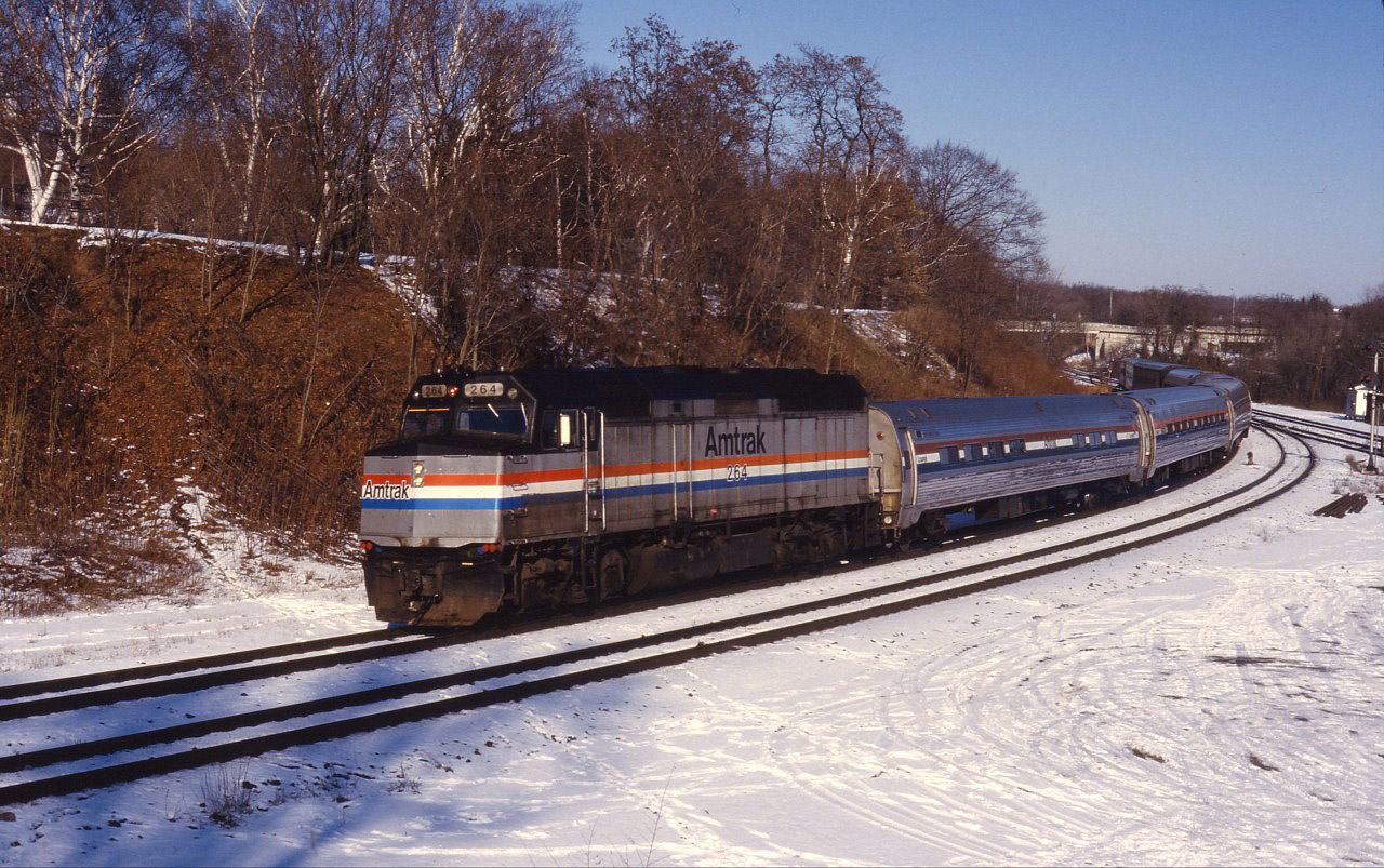 Prior to the January 1990 VIA cuts, the International ran through Bayview, rather than over the Guelph sub. Here we see Amtrak F40PH 264 leading the No. 81 as it enters the Dundas subdivision...next stop Brantford!