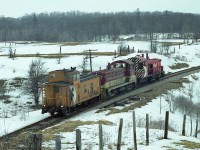 Not the sort of image I usually submit, but I rather like this 'going shot' of the power running light from Aberdeen to Guelph Jct. CP 8157 leads TH&B 51 and van 424021 as they will go up and work the Junction traffic. The view is from the Old York Rd just east of Hwy 6.