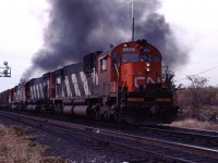 A trio of MLW "big C's", led by C630m 2014, thunder out of Aldershot in the late fall of 1983.