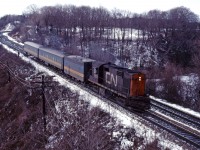 Leased CN RS18 3102 leads an eastbound VIA train through Bayview in early 1982.