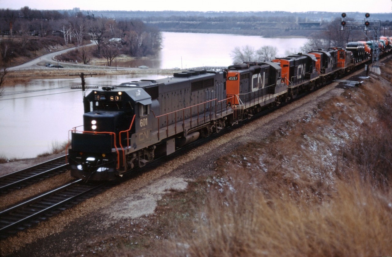 Prior to the start of GO Transit service in May 1967, GO's GP40TC units were tested in CN freight service in southern Ontario. Here we see "CN" 601 (later GO 601, 9801, and 501) leading GP9 4597, two 3600 series RS18s, and SW1200RS 1317 through Bayview with a train from Fort Erie or Niagara Falls in late 1966.