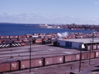 On September 25, 1965 the UCRS sponsored a Toronto-London excursion via Paris and Guelph. Here we see 4-8-4 6218 being serviced at Hamilton. There is SO MUCH to see in this photo...in addition to the Northern, one can see wooden vans, two S4 yard locomotives in black (8168 and another unidentified unit), FPA2u 6758 and FPA4 6780 in then new "CN" stripes, lots of 40 foot cars including some from the CPR and GTW, team tracks, and the express building. Quite a contrast with today's Stuart Street yard.