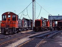 A mixture of SW9 and SW1200 units congregate outside the diesel shop at Stuart Street yard. In the picture we see the 7005, 7035, 1316, 7001, 7006 and 7009. The 7035 has recently been transferred from the Lakehead Division to Hamilton to replace MLW S4 switchers which are now being retired.