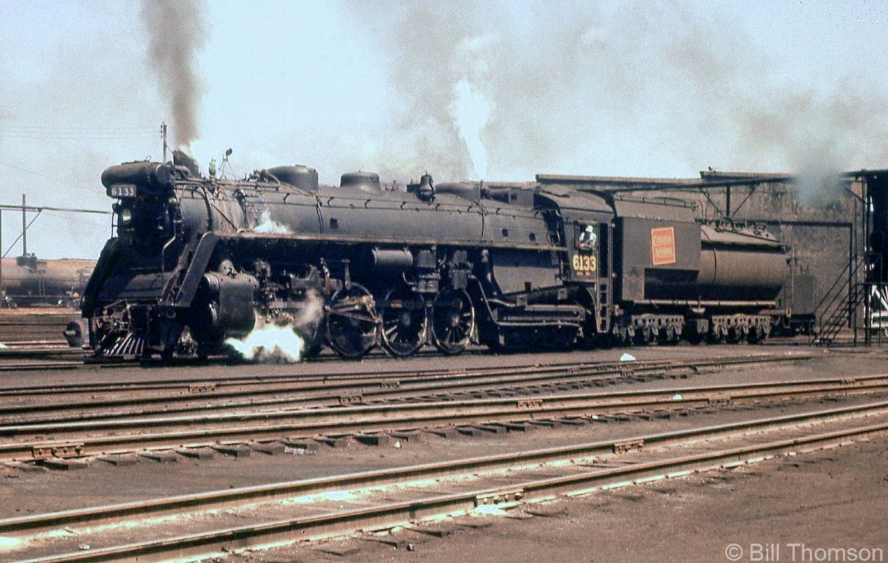 CN U1b Northern 6133 (built by MLW in 1927) is pictured awaiting its next assignment on the ready tracks at Mimico Roundhouse in 1958. Mimico was one of the main CN freight yards in the Toronto area at the time, and the roundhouse boasted a good stable of the big 4-8-4 Northerns, even in the waning years of steam.