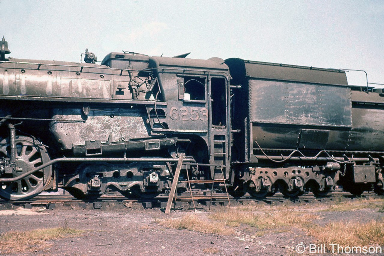 CNR Northern 6253 is pictured at Mimico Yard in 1957 after an incident in service. Leading a train, it apparently hit a vehicle pulling a hot tar trailer (the fireman was badly burned as a result).