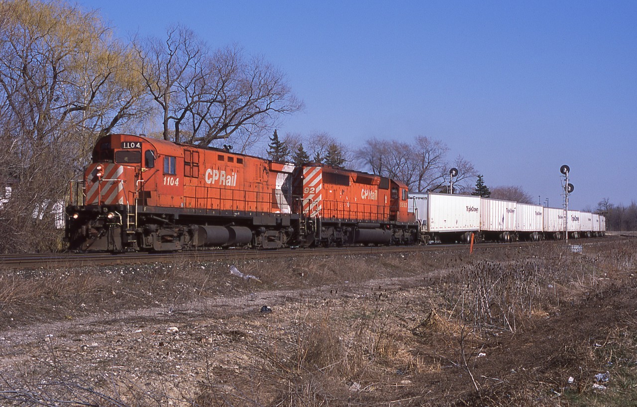 CP's westbound roadrailer is seen just west of Streetsville GO station with cab car 1104 and SD40-2 5592. Both units have been off the roster for 10+ years now. CP 1104 was built as C424 #4226 in 1965 and scrapped in 2004. CP 5592 was built in 1972 and was traded to NRE in 2005.
