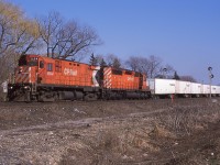 CP's westbound roadrailer is seen just west of Streetsville GO station with cab car 1104 and SD40-2 5592. Both units have been off the roster for 10+ years now. CP 1104 was built as C424 #4226 in 1965 and scrapped in 2004. CP 5592 was built in 1972 and was traded to NRE in 2005. 
