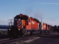 Ah, the long days of summer--tonight's Starlight has a special visitor--"the Empress of Agincourt" RSD17 8921 accompanies SD40 5523 as the train heads east through Bayview.