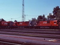 Thirty-one years after leaving Montreal Locomotive Works, S-2 7090 continues to do the work for which she was built at the yard in Sudbury, Ontario. Two younger sisters, C630m 4505 and M630 4562, prepare to take a transcontinental freight out of town.