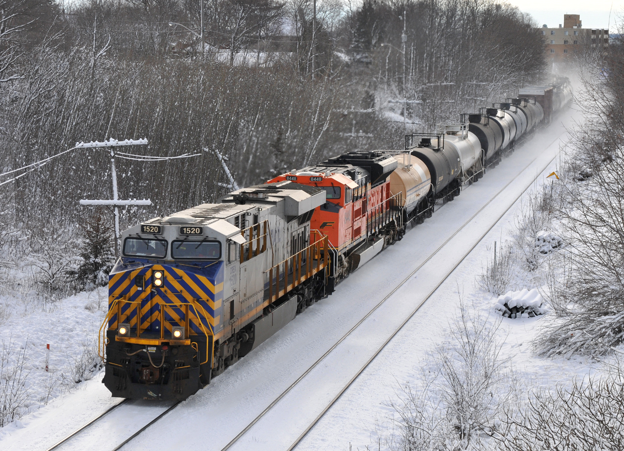 CREX 1520, and BNSF 8448 lead a 162 car M39931 01, which is running roughly 12 hours behind it's usual time slot