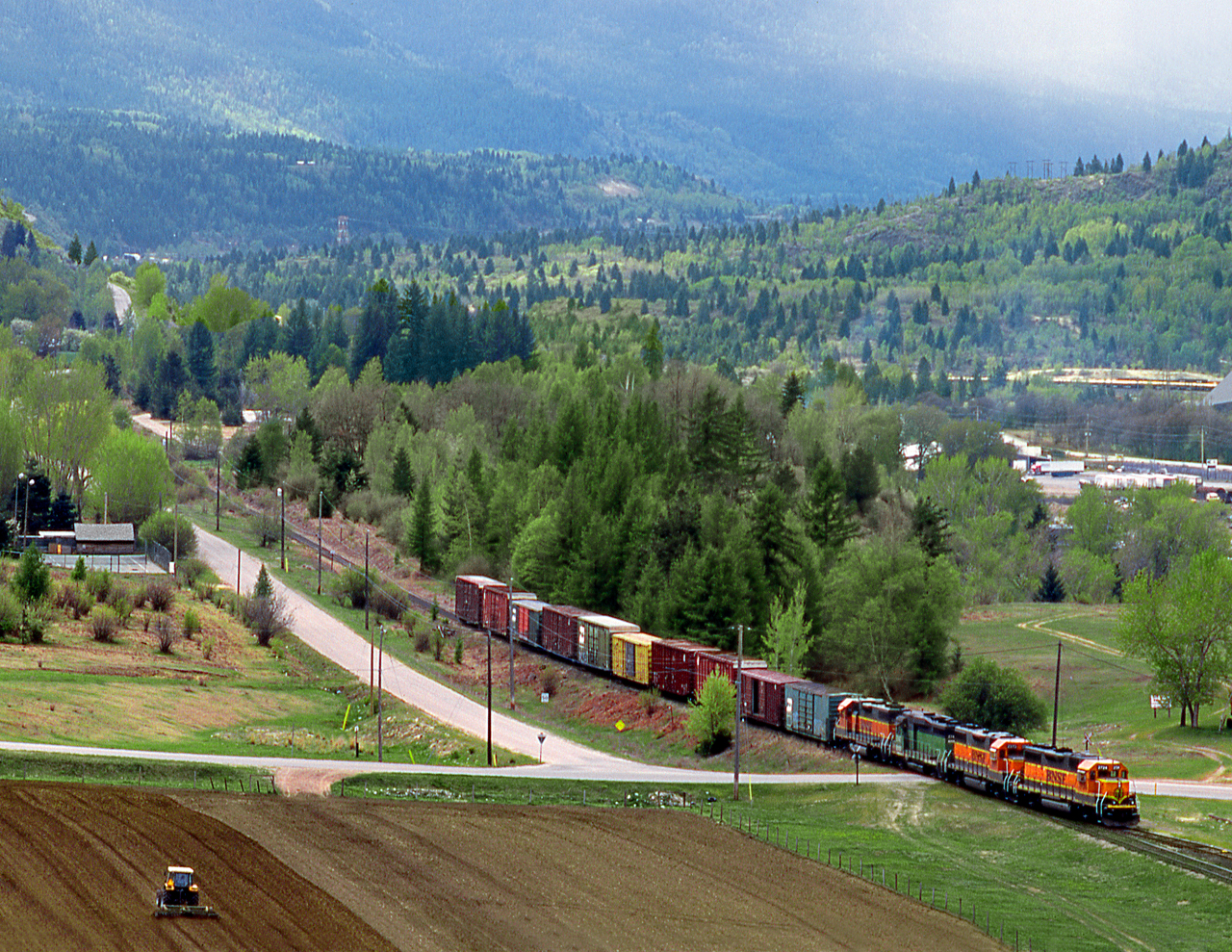 BNSF's Nelson Subdivision local out of Kettle Falls Wash. pulls into the back track at the end of BNSF owned track with cars for the Nelson & Fort Shepard Railroad, owned by Atco Lumber at Fruitvale. The NFS operates the ex GN line from Columbia Gardens 6 miles to Fruitvale. The balance of GN's historic line to Nelson is abandoned