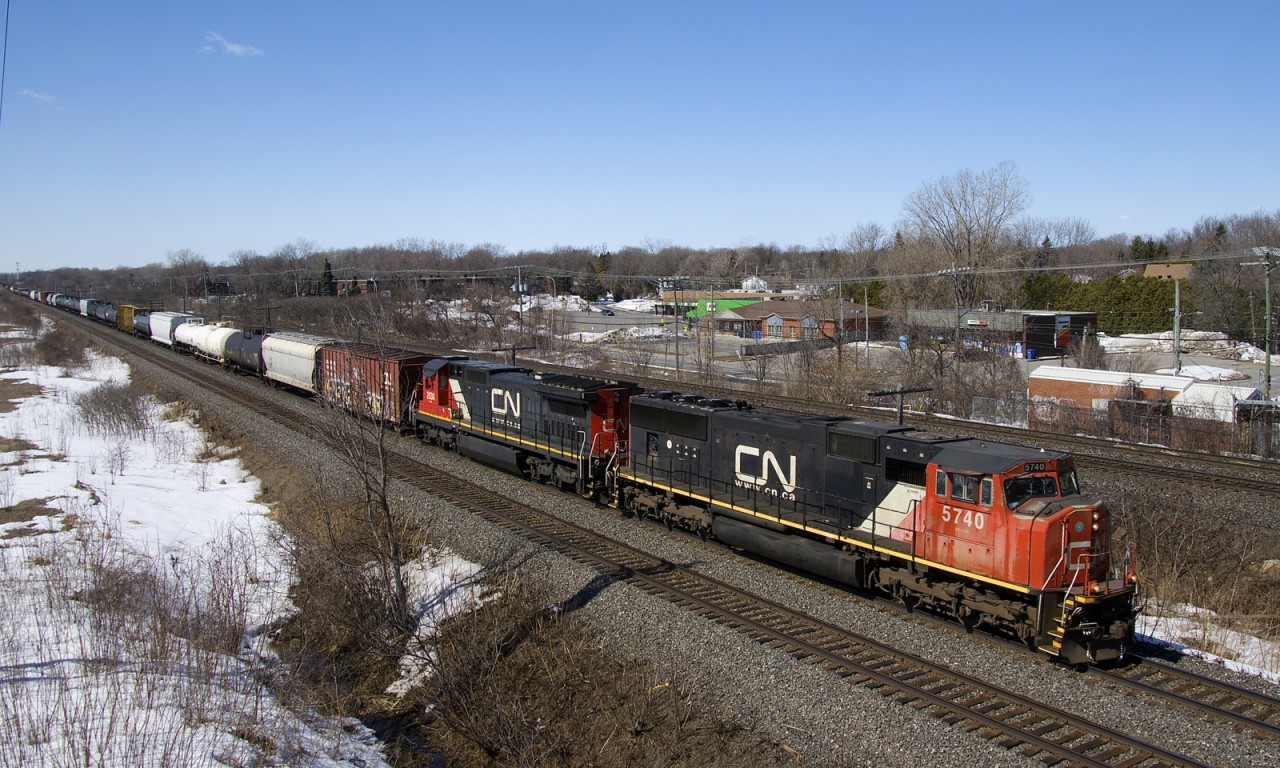 CN 5740 & CN 2030 lead CN 368 through Beaconsfield, a welcome respite from the usual 1+1 GEVO's found on this train.