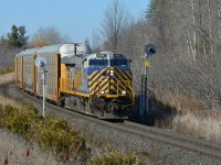 To join the theme of leased units, CN E273 rolls through the mile 30 intermediates with 11,000ft of racks for WIndsor