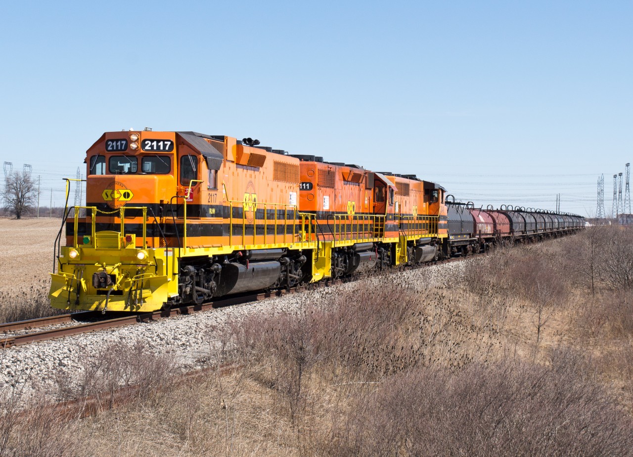 RLHH 595 is seen headed towards STELCO with 15 coil cars.  Power today was RLHH 2117, RLHH 21111, RLHH 3049, with SD40-2 3403 on loan to the GEXR and SD40-2 3404 in Hamilton for service, a trio of geeps is holding down the road freight.  It has been quite some time since I have seen a trio of geeps being utilized on 595/597.