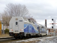 ALP-45DP AMT 1369 is unusually running long hood forward as it heads west on CN's Montreal Sub with multilevel coach AMT 3002 in tow. It will run this way for about 7.5 miles, originating at the RTM maintenance centre in Pointe St-Charles and heading to CN's Taschereau Yard. From there it will probably be interchanged to the CP for transfer to RTM lines that run on CP tracks.