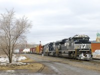 A 26-car CN 528 has NS 1018, NS 6962 & NS 9374 for power as it heads east on CN's Montreal Sub, on its way to Rouses Point, NY and interchange with CP where it will become CP 930.