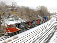 CN 149 has SD75I's CN 5710 & CN 5733 & Dash8-40CW CN 2160 as it heads west on the transfer track of CN's Montreal Sub as it finishes up its lift of traffic left by CN 121 on track 29 the previous night.